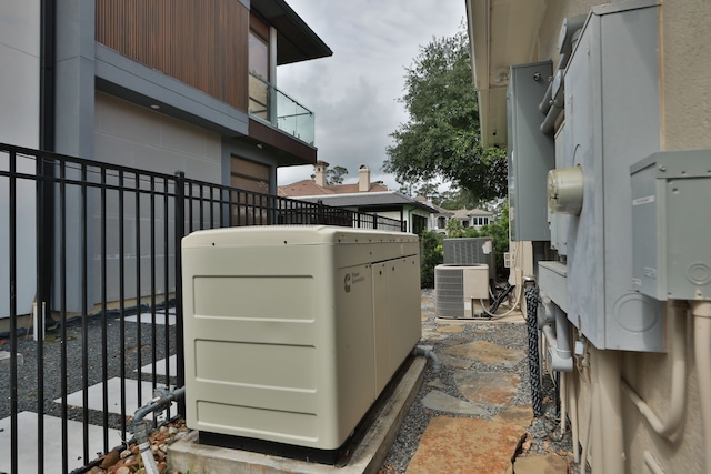 details with fence and central AC
