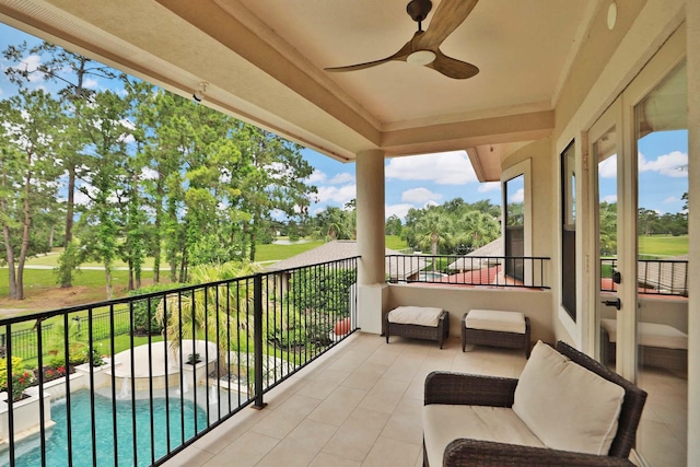 balcony featuring ceiling fan