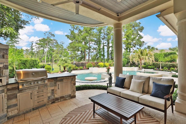 view of patio featuring a ceiling fan, an in ground hot tub, an outdoor pool, and area for grilling