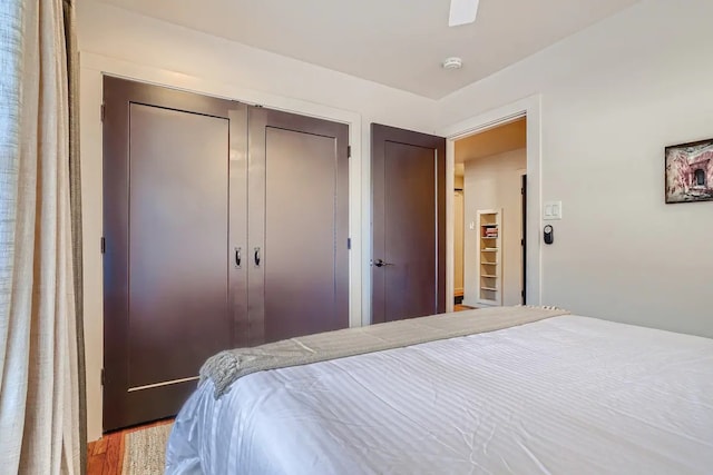 bedroom featuring a closet and wood finished floors