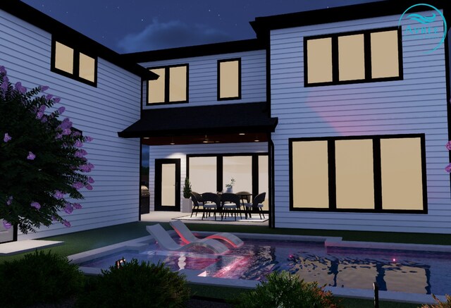 rear view of property featuring a patio