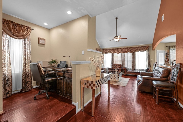 5542 Morgan Park Ln, Sugar Land, TX 77479 - home office with visible vents, dark wood-style flooring, ceiling fan, high vaulted ceiling, and arched walkways