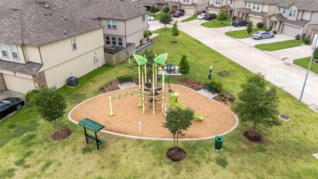 birds eye view of property with a residential view