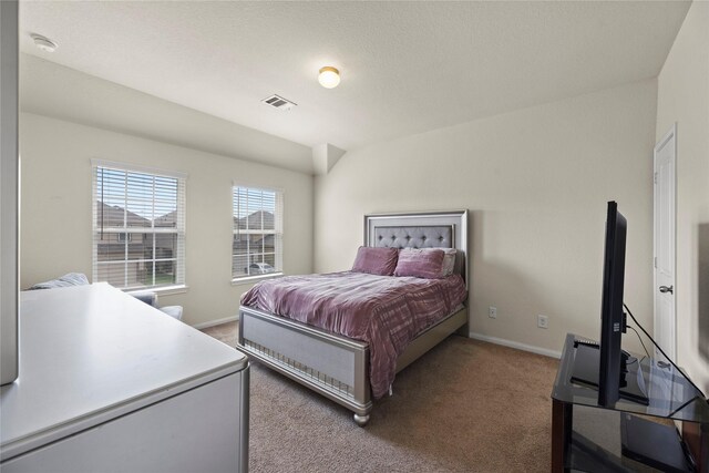 bedroom featuring baseboards, carpet, and visible vents