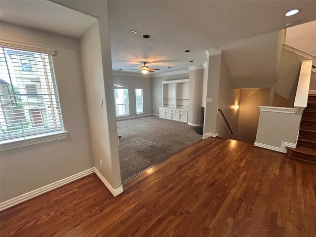 unfurnished living room featuring recessed lighting, baseboards, ceiling fan, and wood finished floors