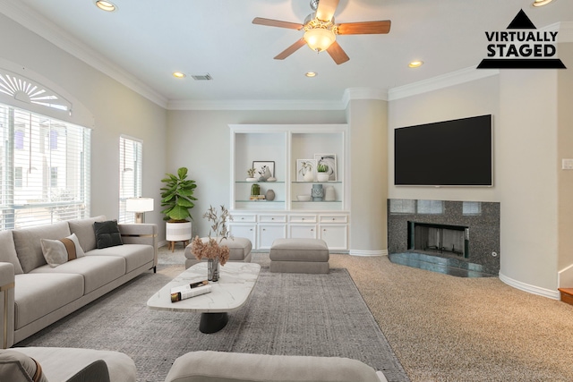 9907 Adeline Ln, Houston, TX 77054 - living area with ceiling fan, recessed lighting, ornamental molding, carpet flooring, and a fireplace