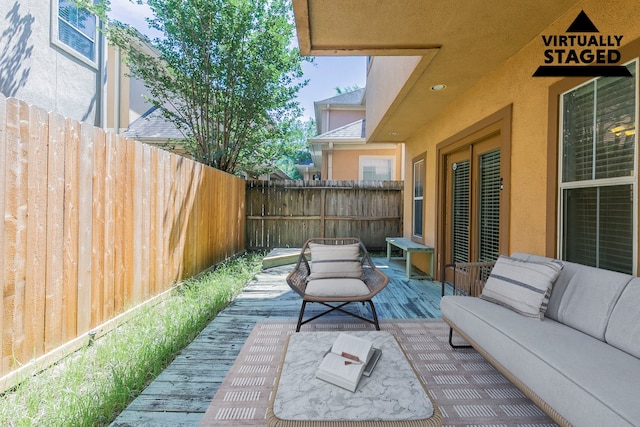 9907 Adeline Ln, Houston, TX 77054 - view of patio with an outdoor living space, fence, and a wooden deck