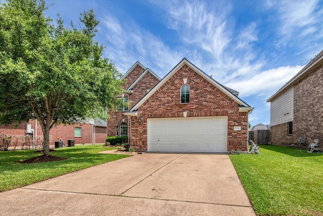 traditional home with driveway, a garage, brick siding, central AC, and a front lawn