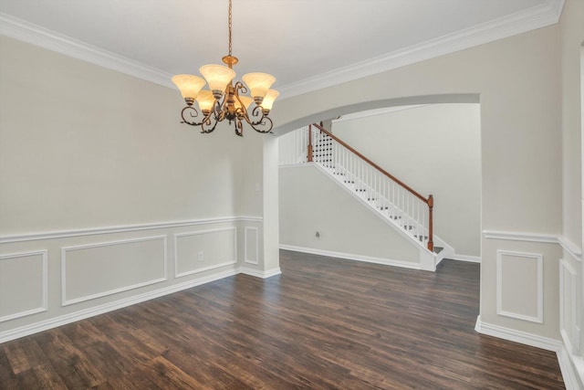 unfurnished dining area with arched walkways, stairs, wood finished floors, and a chandelier