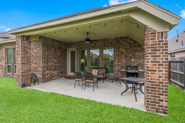 view of patio / terrace featuring a ceiling fan and grilling area