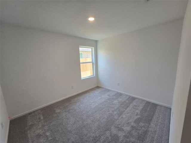 408 Emma St, Angleton, TX 77515 - carpeted empty room featuring baseboards and recessed lighting