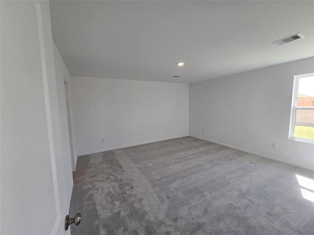 408 Emma St, Angleton, TX 77515 - carpeted empty room with baseboards and recessed lighting