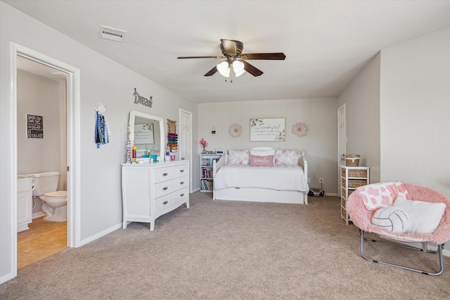 2411 Lakeway Dr, Friendswood, TX 77546 - bedroom with visible vents, carpet floors, baseboards, ceiling fan, and connected bathroom