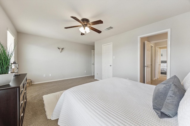 2411 Lakeway Dr, Friendswood, TX 77546 - bedroom featuring light colored carpet, baseboards, visible vents, and ceiling fan