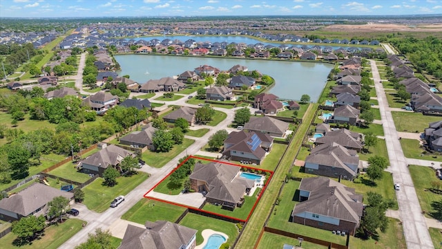 2411 Lakeway Dr, Friendswood, TX 77546 - drone / aerial view with a water view and a residential view