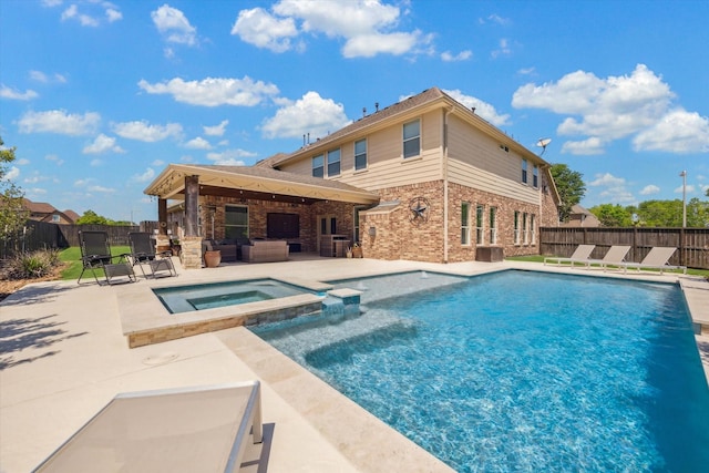 2411 Lakeway Dr, Friendswood, TX 77546 - view of swimming pool with a pool with connected hot tub, a patio area, a gazebo, a fenced backyard, and an outdoor hangout area