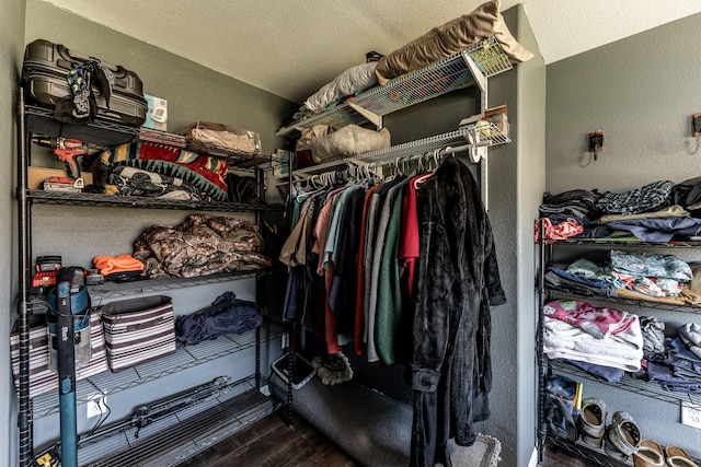 239 Fishermans Trl, Huntsville, TX 77320 - spacious closet featuring wood finished floors
