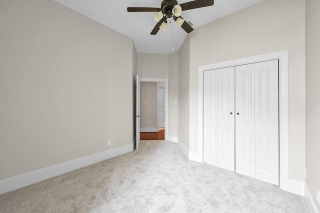 73 La Jolla Cir, Montgomery, TX 77356 - unfurnished bedroom with a ceiling fan, carpet floors, baseboards, a closet, and lofted ceiling