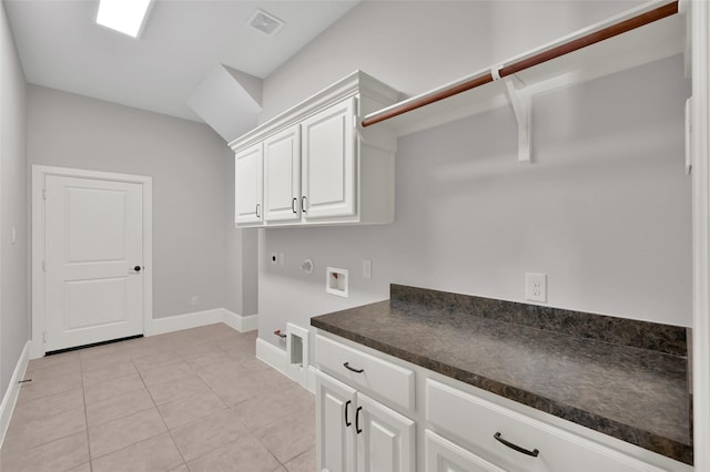 73 La Jolla Cir, Montgomery, TX 77356 - washroom with electric dryer hookup, hookup for a gas dryer, cabinet space, baseboards, and hookup for a washing machine