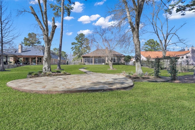 73 La Jolla Cir, Montgomery, TX 77356 - view of yard with fence, a patio, and a sunroom