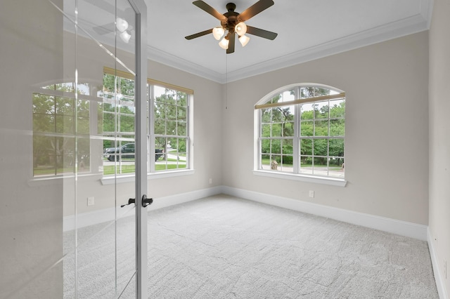 73 La Jolla Cir, Montgomery, TX 77356 - empty room featuring crown molding, carpet flooring, baseboards, and ceiling fan