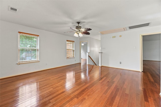 4614 Ringrose Dr, Missouri City, TX 77459 - empty room with ceiling fan, attic access, wood finished floors, and visible vents