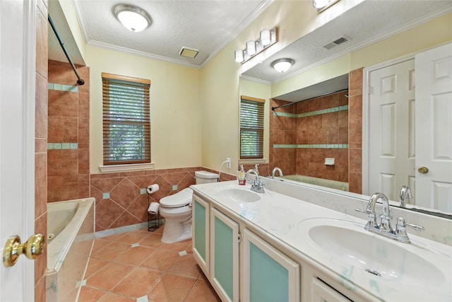 4614 Ringrose Dr, Missouri City, TX 77459 - bathroom featuring tile walls, visible vents, a sink, and tile patterned flooring