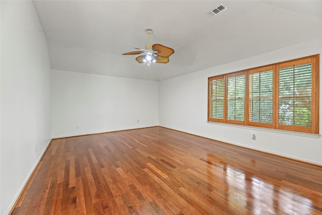 4614 Ringrose Dr, Missouri City, TX 77459 - empty room featuring baseboards, a ceiling fan, wood finished floors, and visible vents