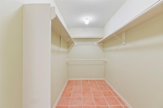 4614 Ringrose Dr, Missouri City, TX 77459 - spacious closet with light tile patterned flooring