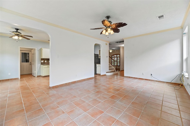 4614 Ringrose Dr, Missouri City, TX 77459 - unfurnished room featuring ornamental molding, arched walkways, light tile patterned flooring, and ceiling fan