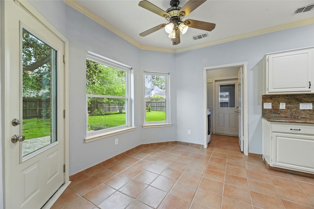 4614 Ringrose Dr, Missouri City, TX 77459 - unfurnished dining area featuring visible vents, ornamental molding, ceiling fan, and light tile patterned flooring