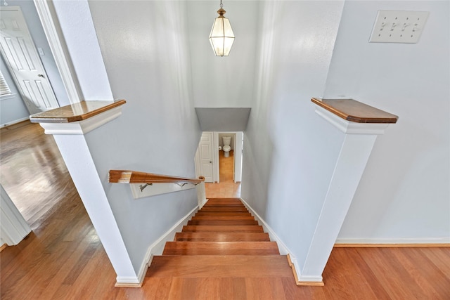 4614 Ringrose Dr, Missouri City, TX 77459 - stairs featuring baseboards and wood finished floors