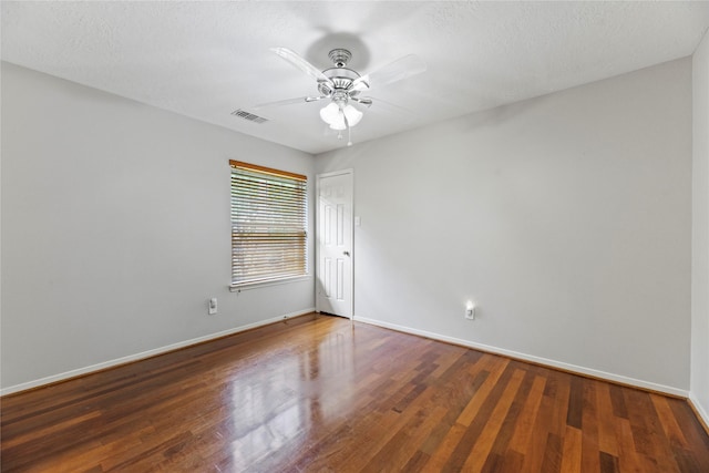 4614 Ringrose Dr, Missouri City, TX 77459 - empty room with baseboards, a ceiling fan, wood finished floors, and visible vents