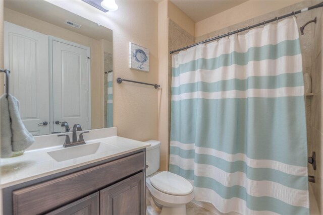 full bathroom with visible vents, a shower with curtain, toilet, and vanity