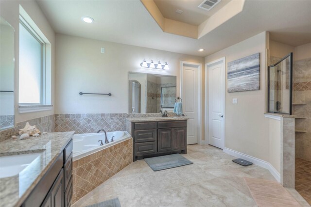 full bathroom featuring a tile shower, tile patterned flooring, two vanities, visible vents, and a bath