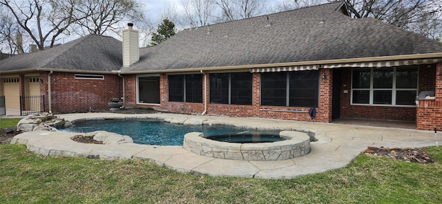 outdoor pool with a patio area