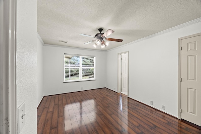empty room with crown molding, a textured ceiling, ceiling fan, and visible vents