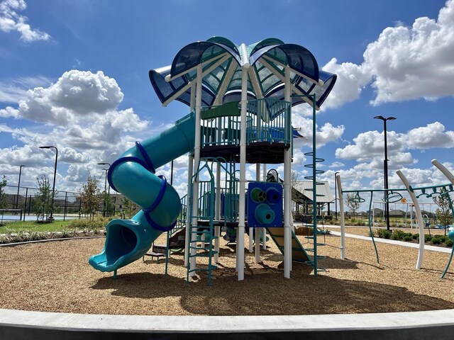 community play area featuring fence