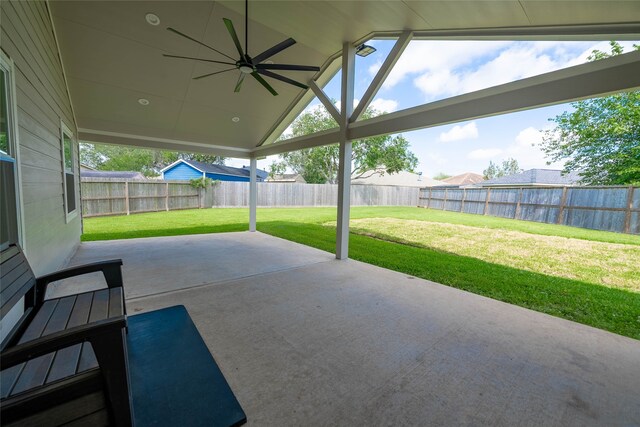 view of patio with a fenced backyard and ceiling fan