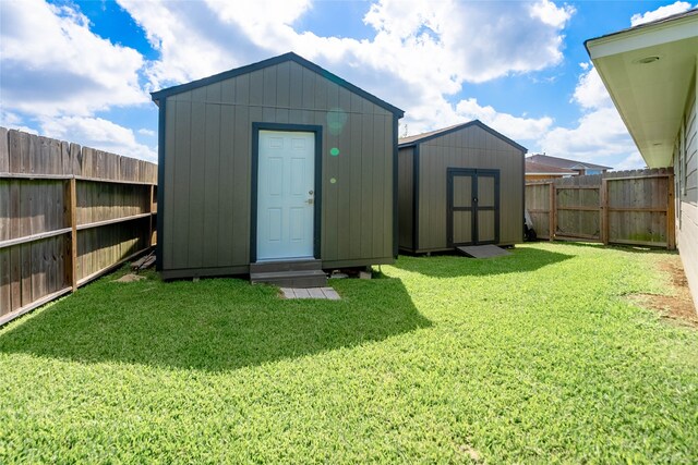 view of shed featuring a fenced backyard