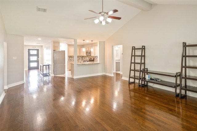 unfurnished living room featuring a ceiling fan, baseboards, visible vents, and dark wood-style floors