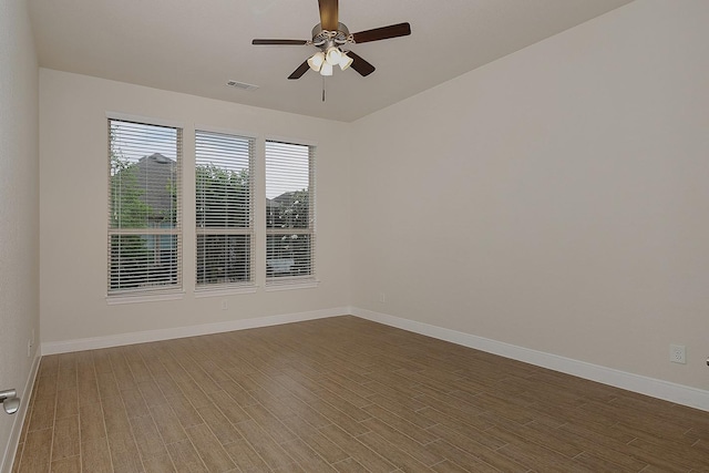 249 Palomino Ct, The Woodlands, TX 77382 - spare room with baseboards, ceiling fan, and wood finished floors