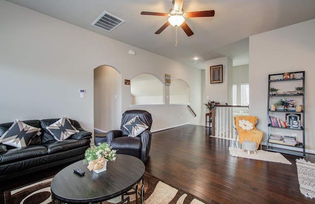 7610 River Pass Dr, Pearland, TX 77581 - living area featuring a ceiling fan, arched walkways, visible vents, and hardwood / wood-style floors