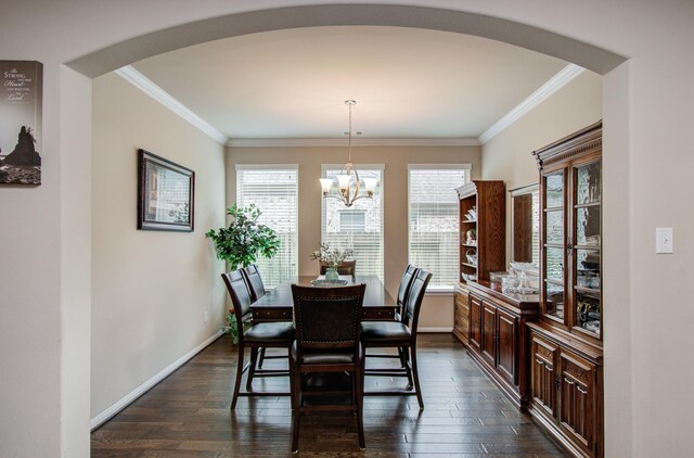 7610 River Pass Dr, Pearland, TX 77581 - dining area with baseboards, arched walkways, and dark wood-style floors