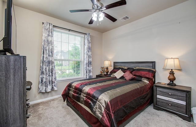 7610 River Pass Dr, Pearland, TX 77581 - bedroom featuring carpet floors, baseboards, visible vents, and multiple windows