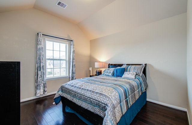 7610 River Pass Dr, Pearland, TX 77581 - bedroom with baseboards, lofted ceiling, wood finished floors, and visible vents