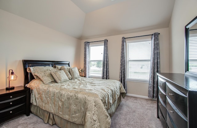 7610 River Pass Dr, Pearland, TX 77581 - bedroom featuring baseboards, light colored carpet, and vaulted ceiling