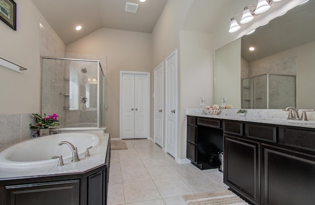 7610 River Pass Dr, Pearland, TX 77581 - full bath featuring a garden tub, visible vents, a shower stall, tile patterned floors, and lofted ceiling