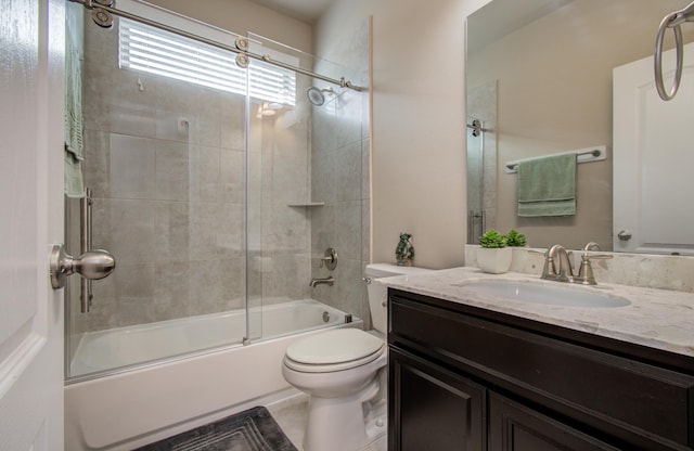 7610 River Pass Dr, Pearland, TX 77581 - bathroom featuring vanity, toilet, and shower / bath combination with glass door