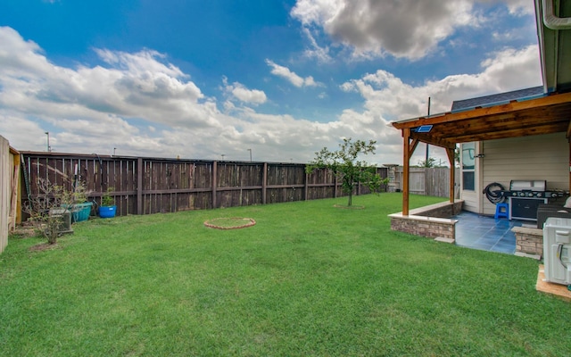 7610 River Pass Dr, Pearland, TX 77581 - view of yard featuring a patio and a fenced backyard